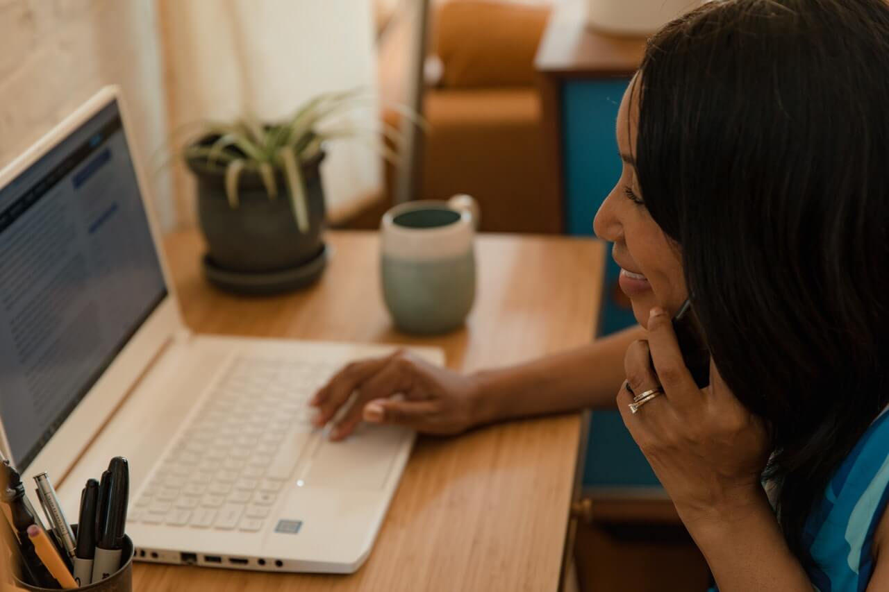 An-office-lady-making-a-call-with-her-cell-phone