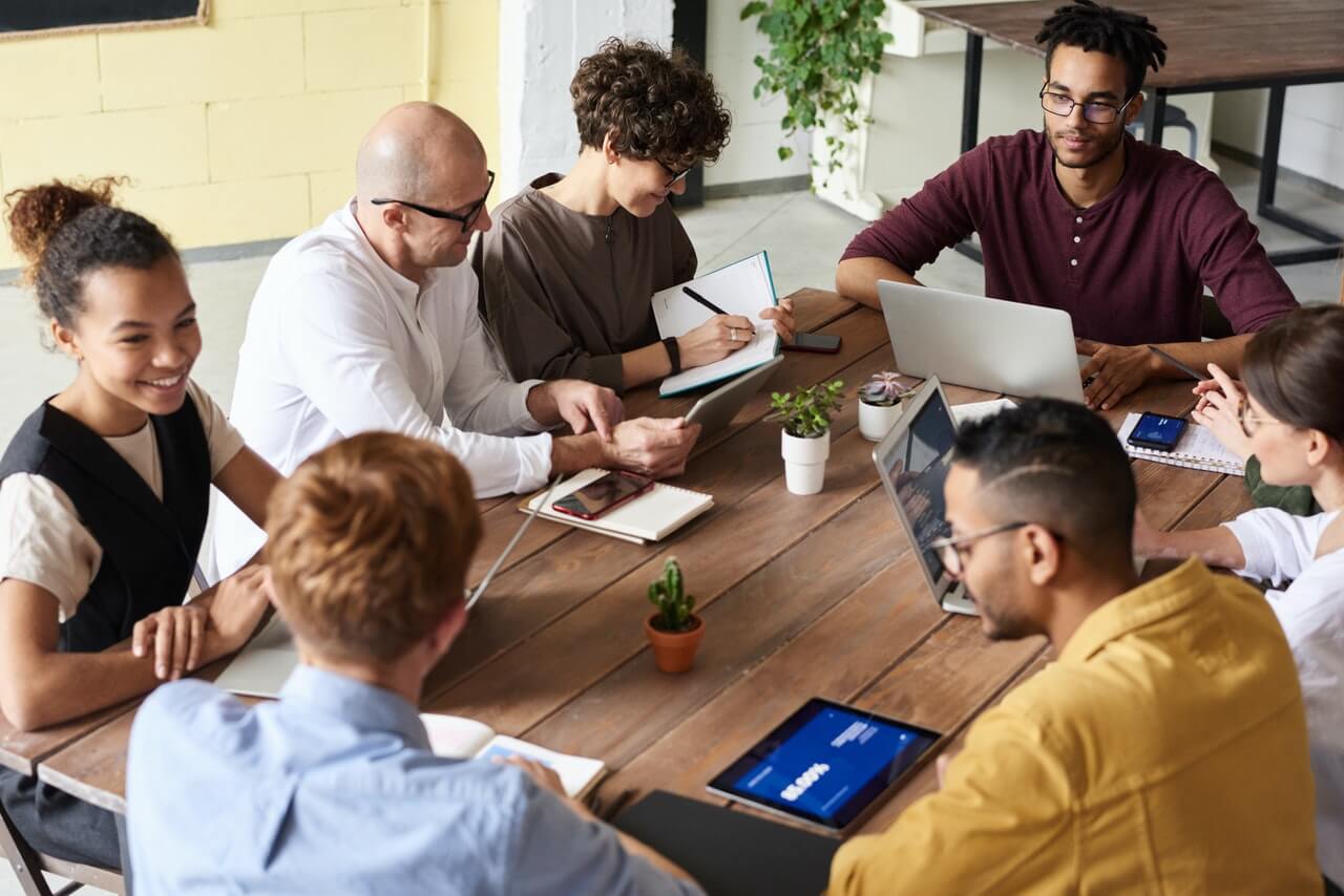 Group of people having a team meeting