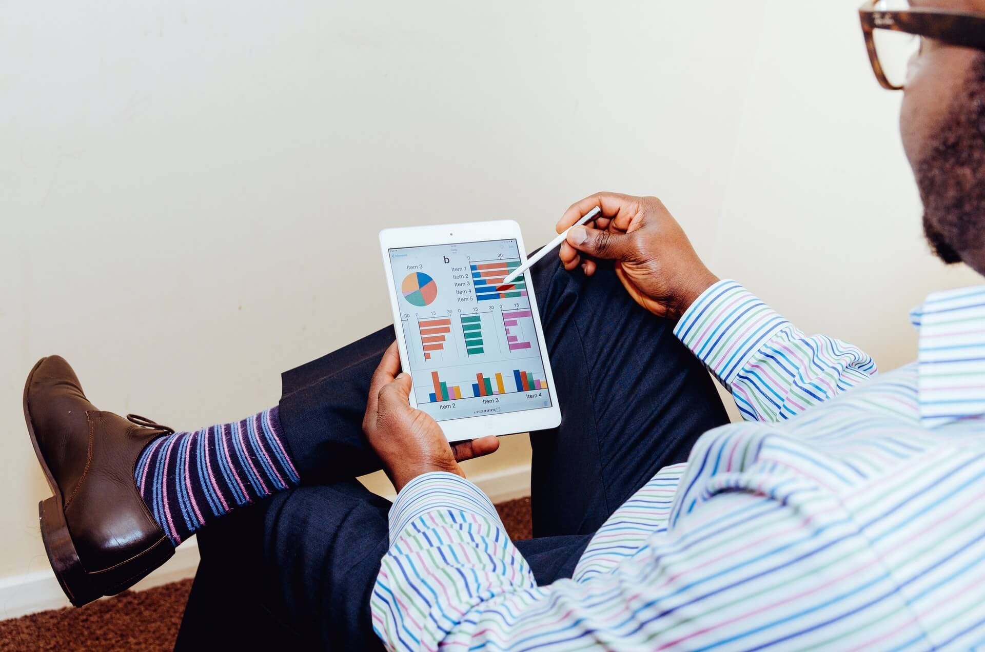 Man looking at a graph