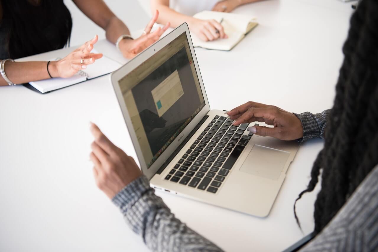 Person researching with a laptop