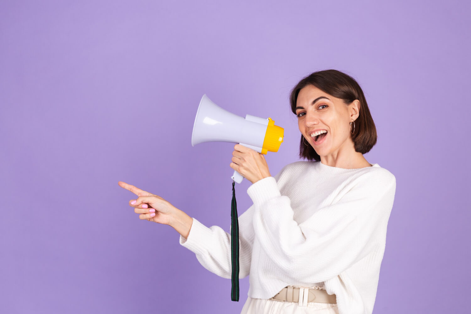 Young lady holding a megaphone