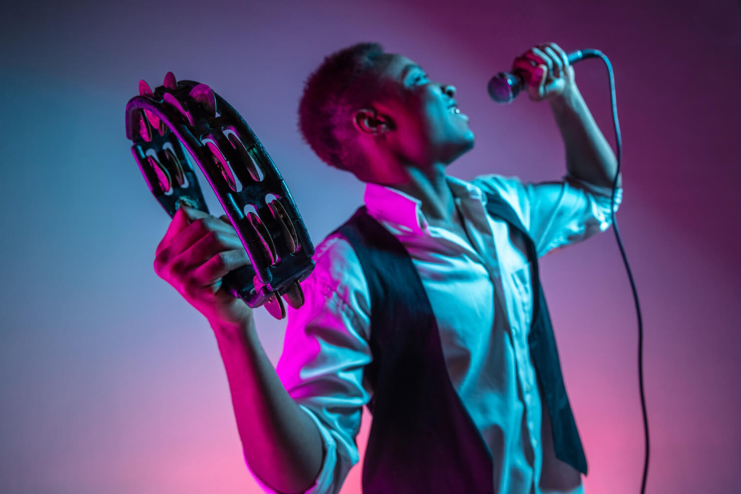 african-american-handsome-jazz-musician-playing-tambourine-singing