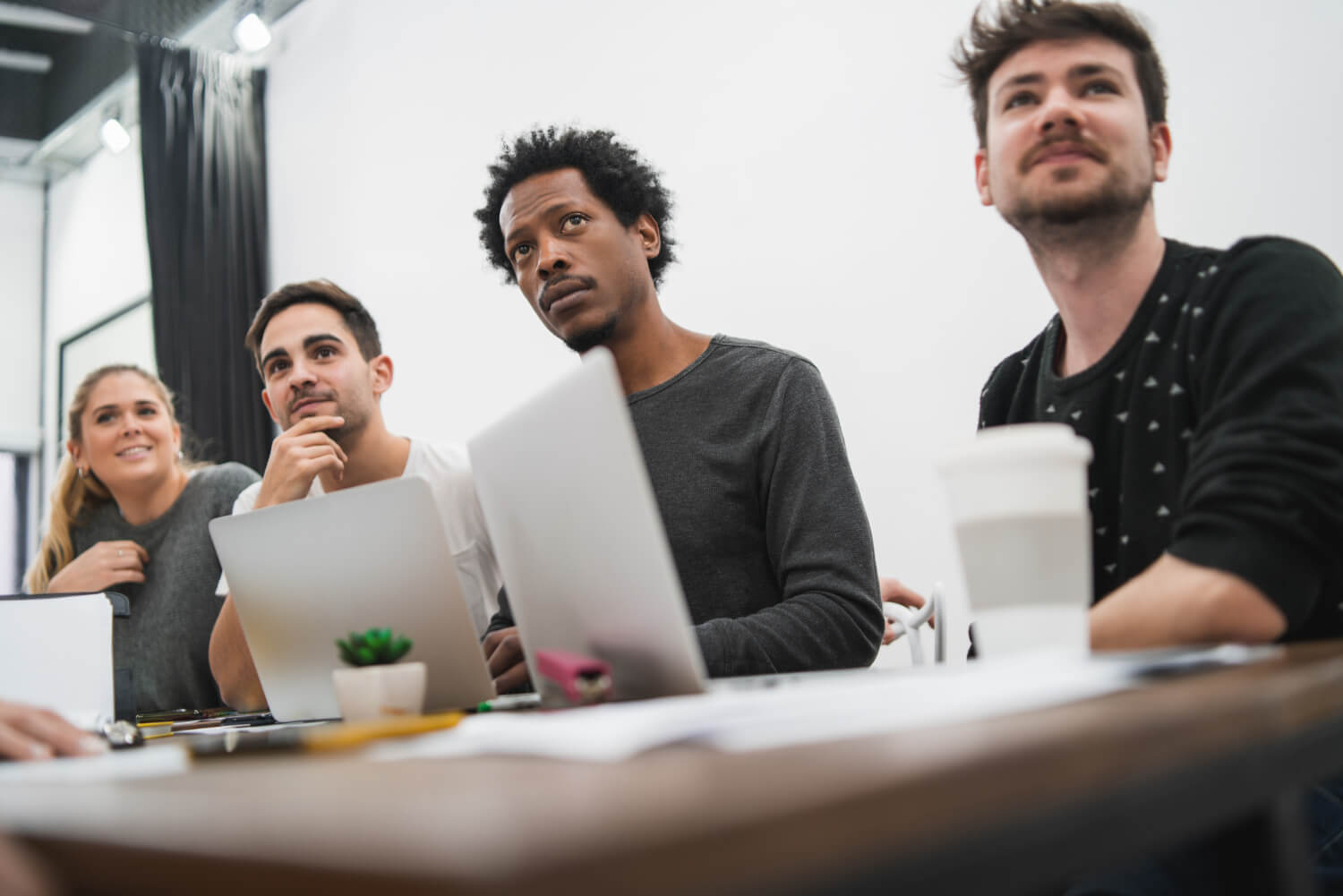 creative-business-people-listening-colleague