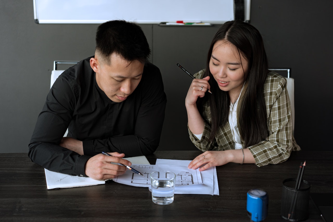 A Man and a Woman Brainstorming