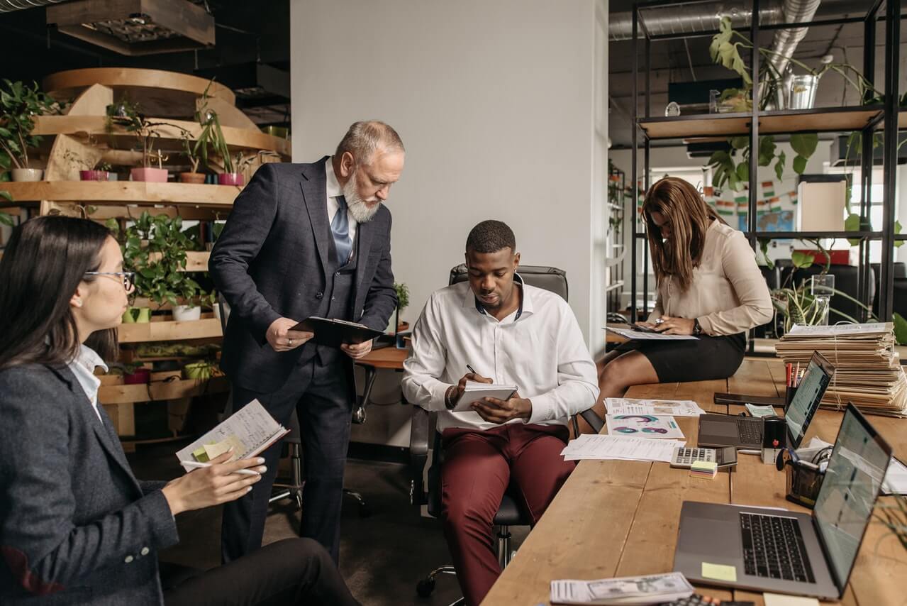 A-crisis-management-team-in-an-office-working-together.