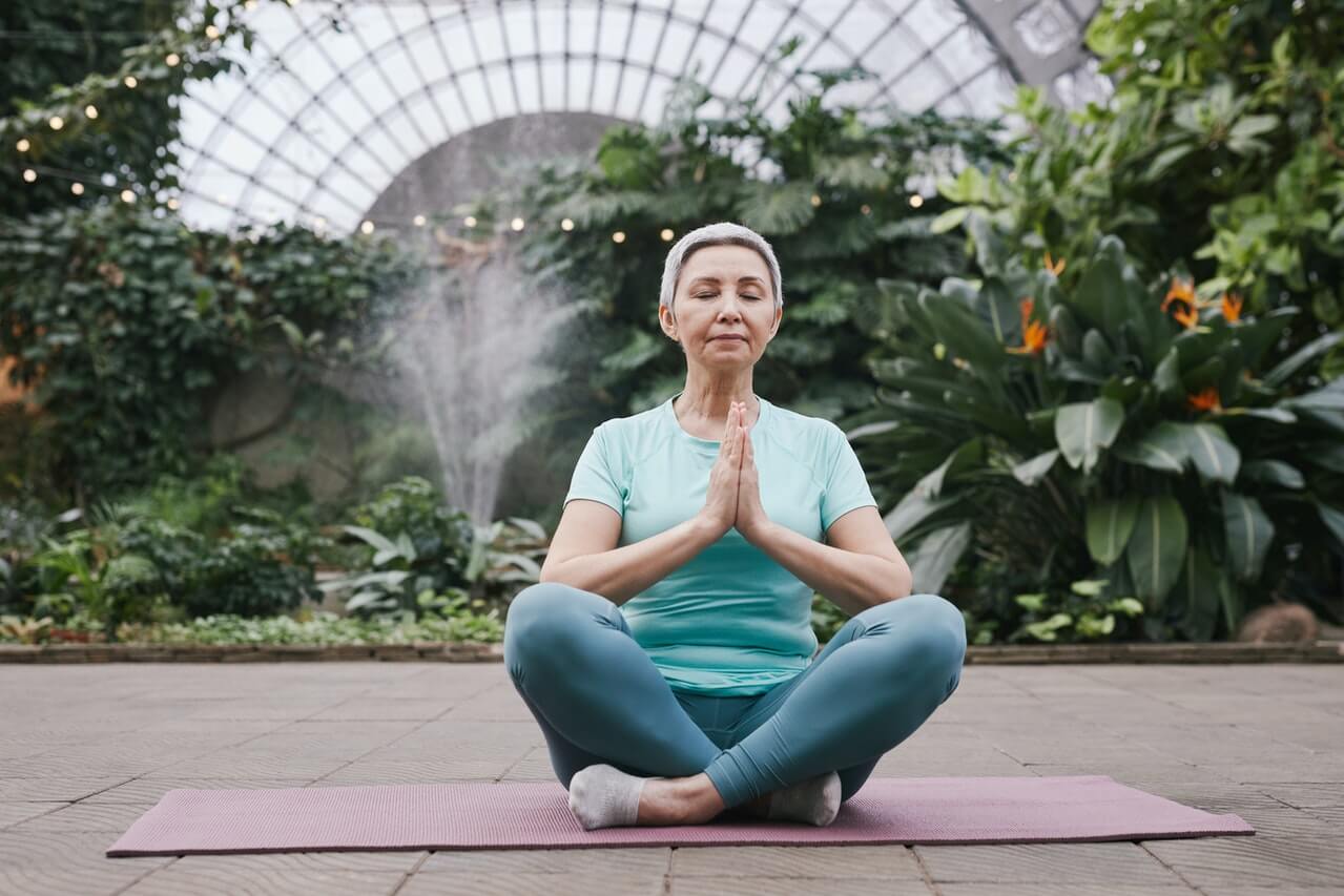 A-spiritual-teacher-meditating-outside.