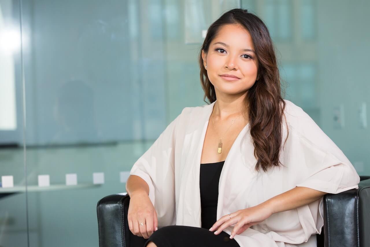 Business woman sitting in a chair