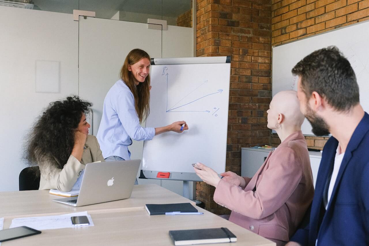 Colleagues working together in modern workspace