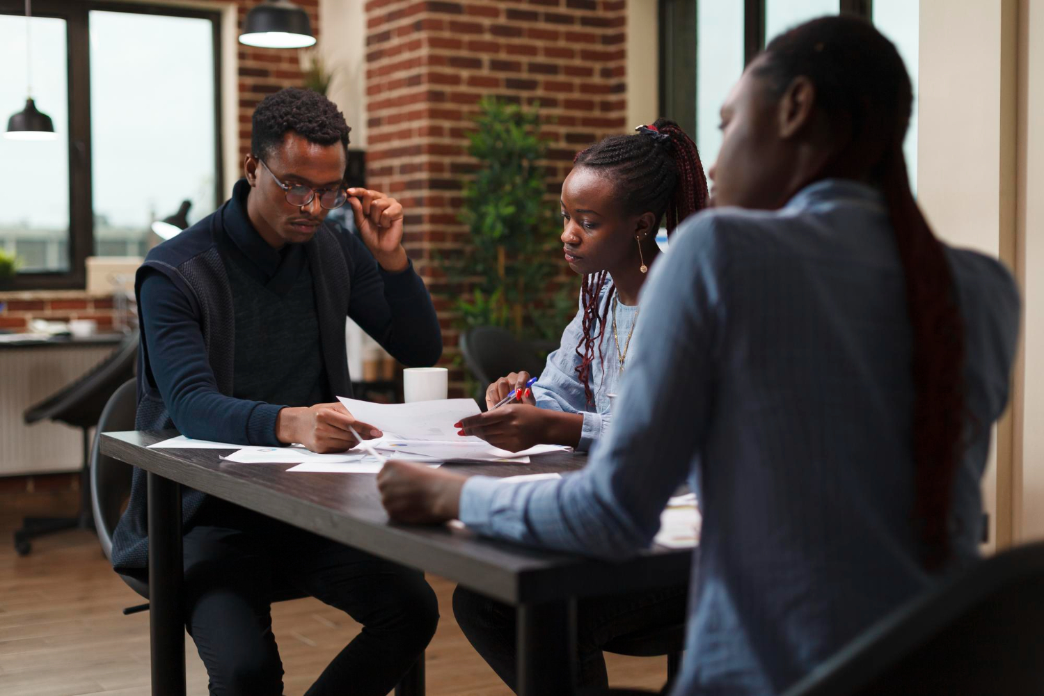 Collegues going through business documents