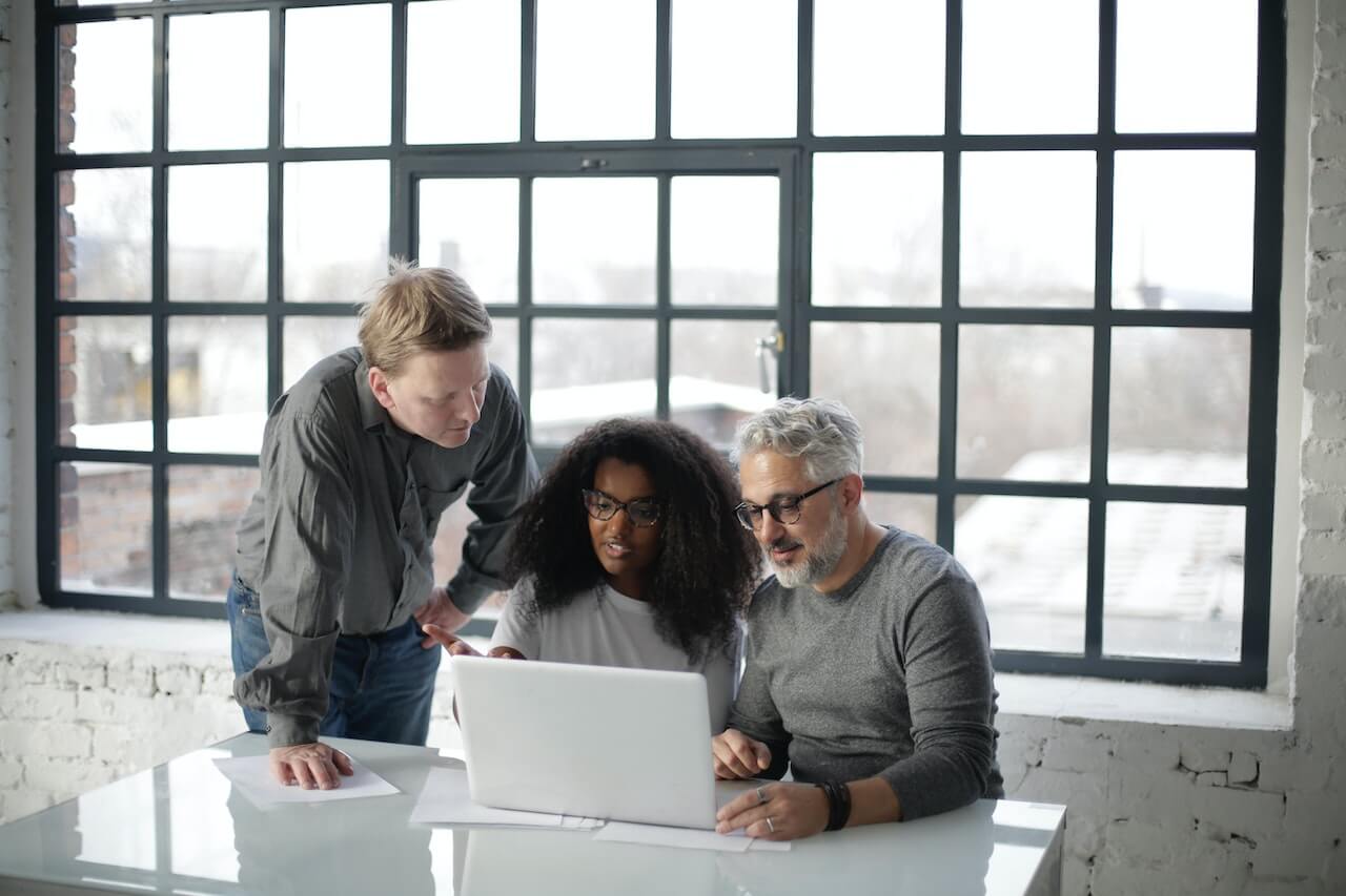 Group of people together in a work space