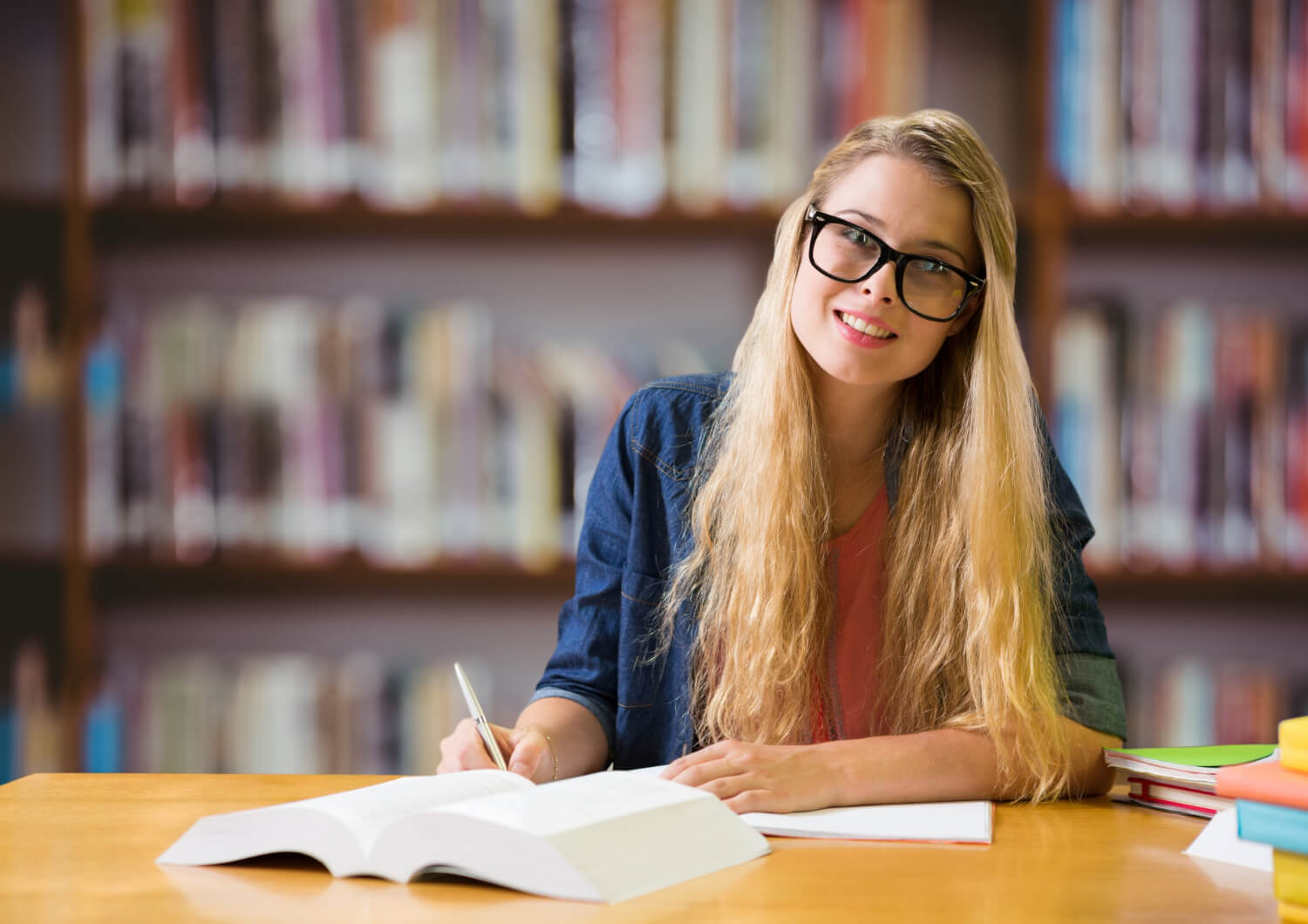 Lady reading in a library