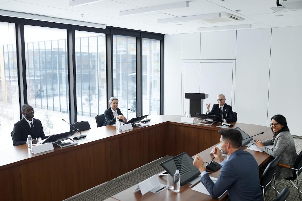 Professional People Sitting at the Table