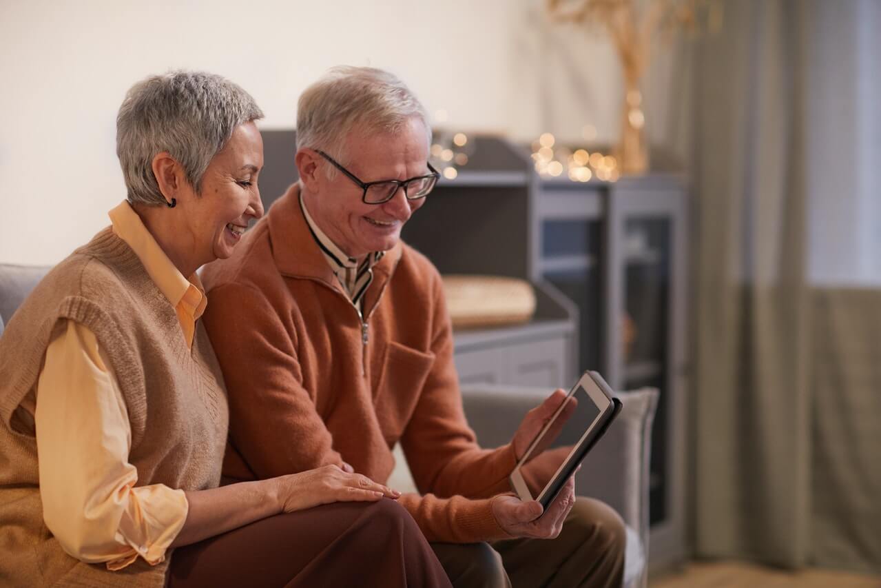 Two-grannys-looking-at-a-note-pad