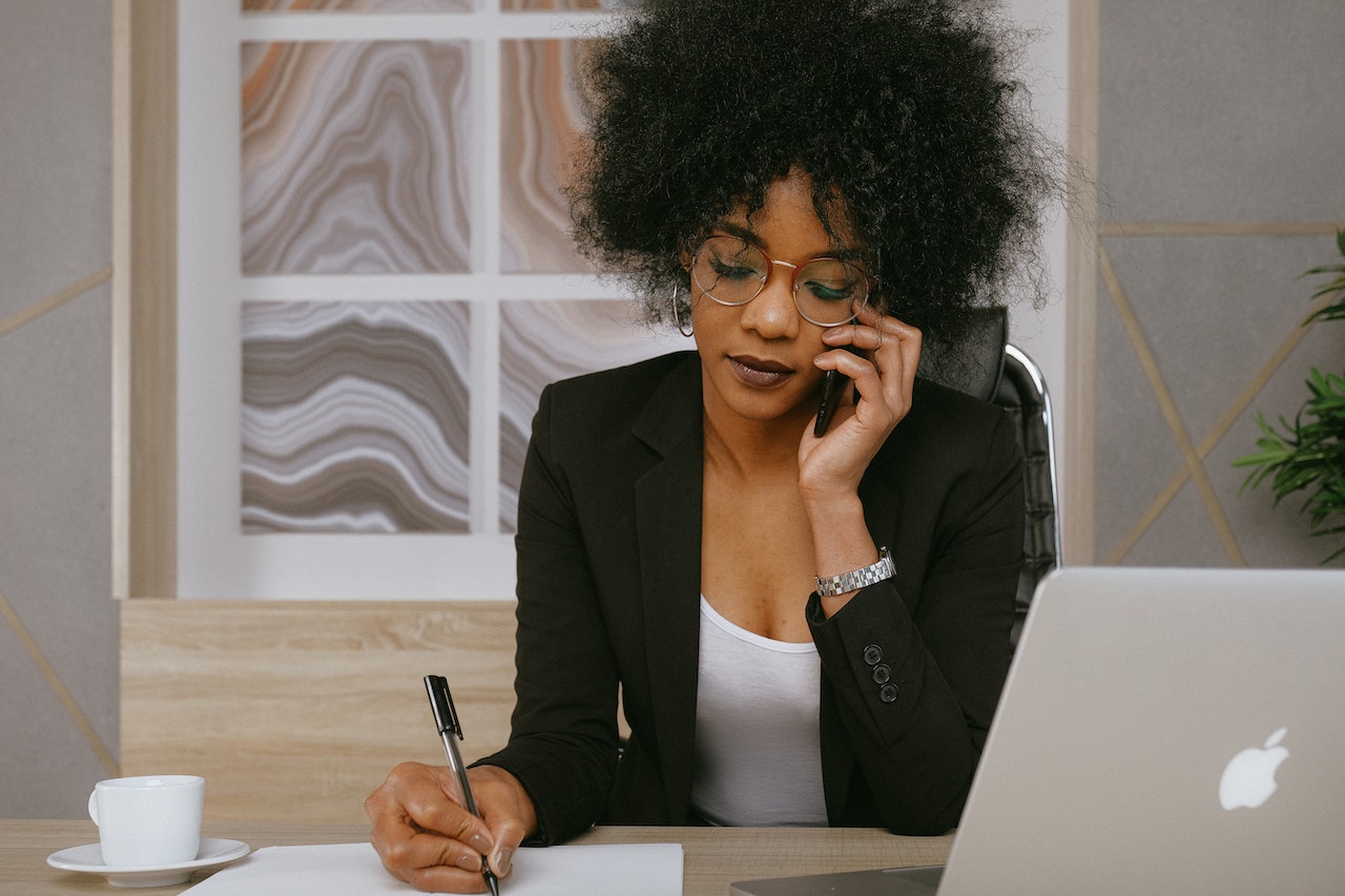 Woman Holding Smartphone Working