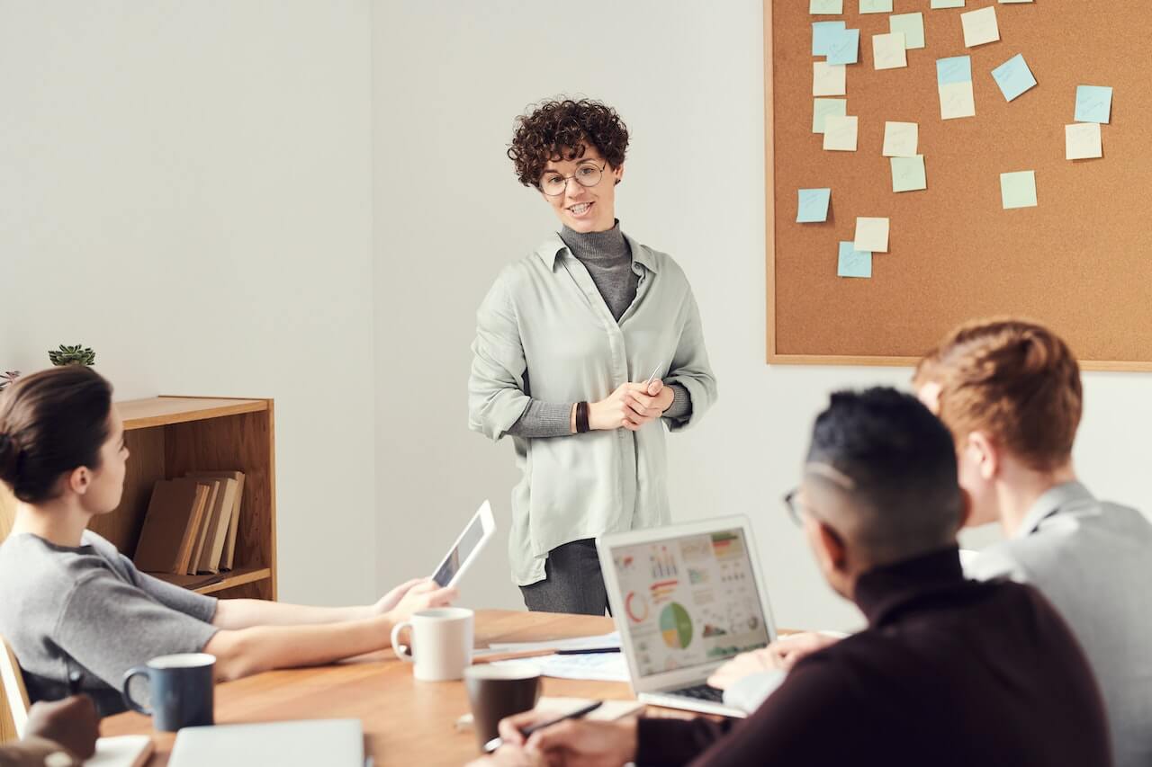 Young business woman leading a meeting