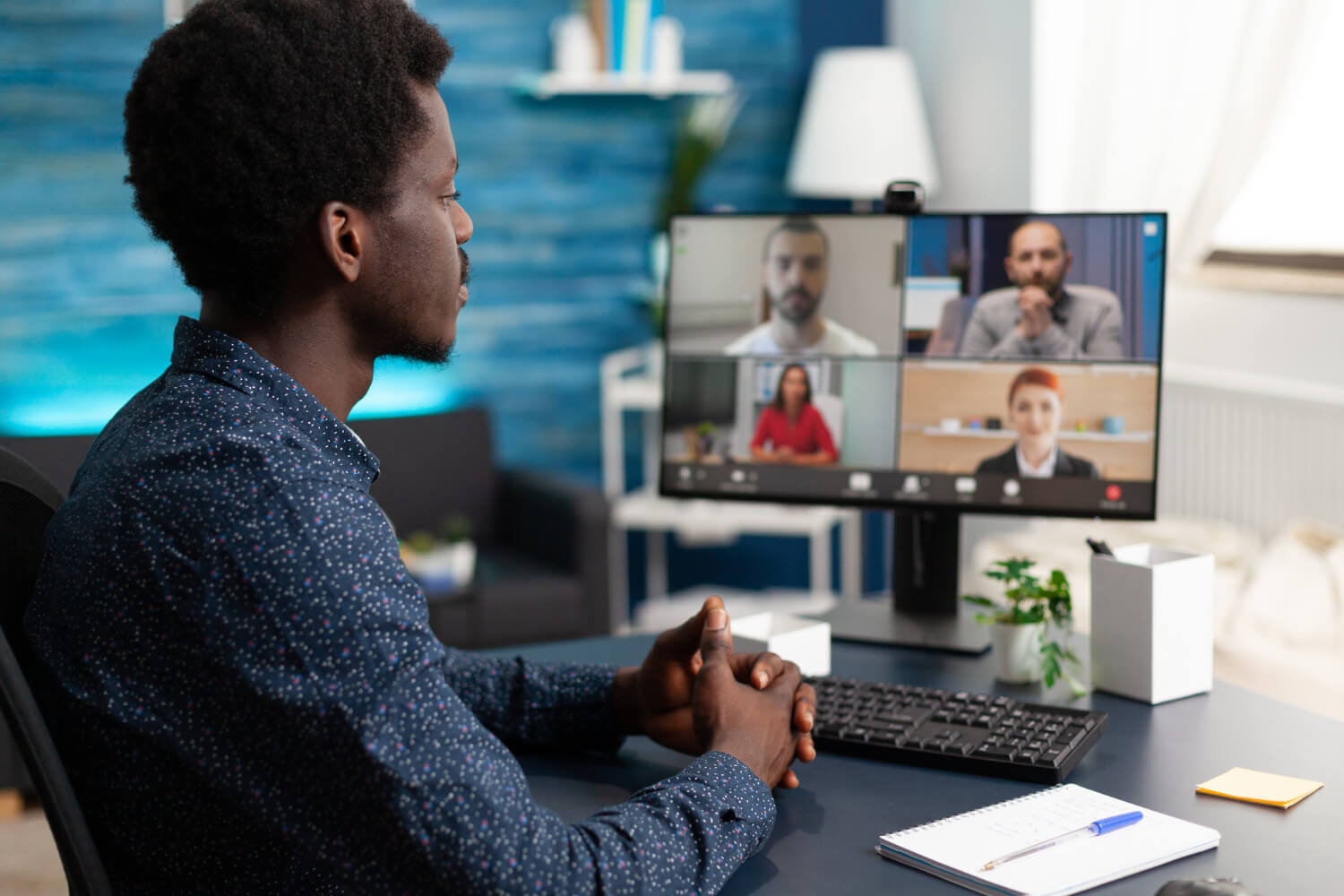 Young man learning through a video call