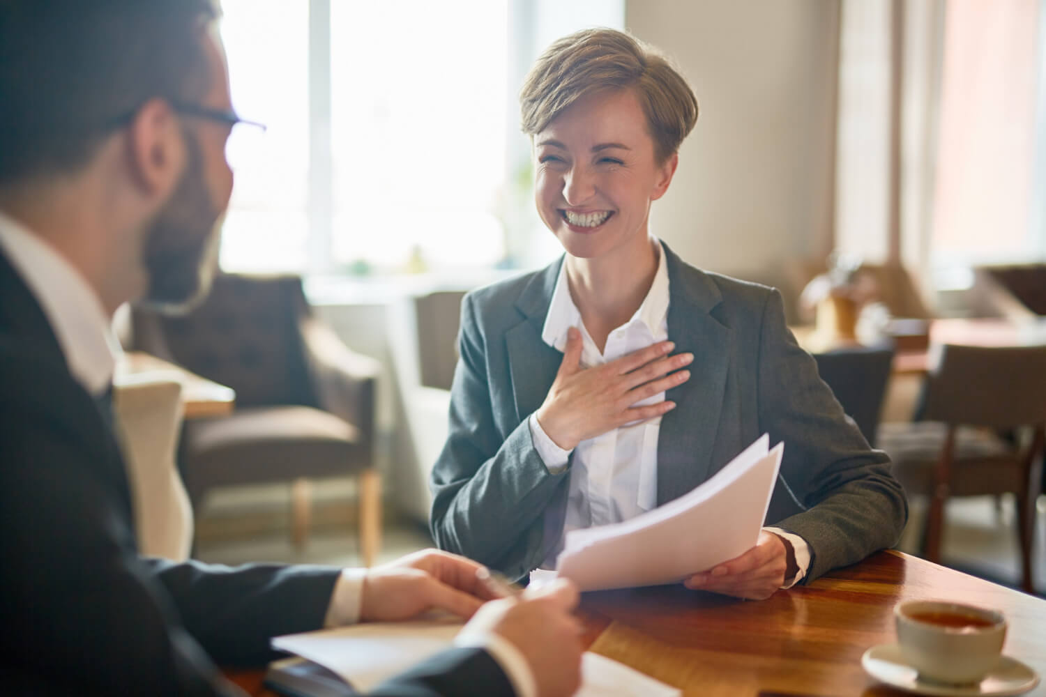 A-bussiness-woman-discussing-with-a-man-in-an-office