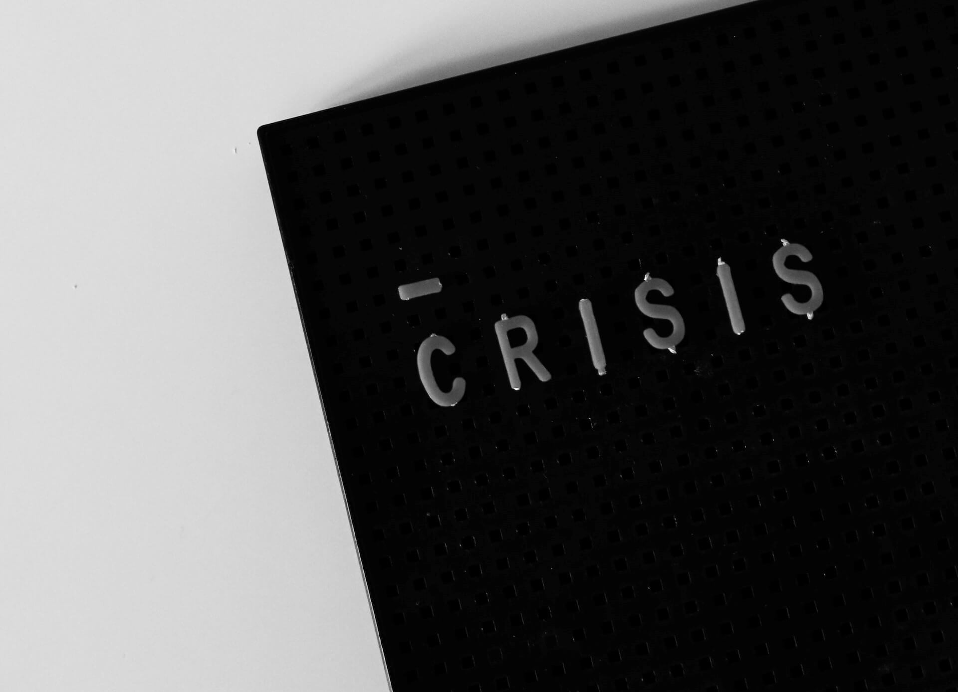 Crisis on a black background