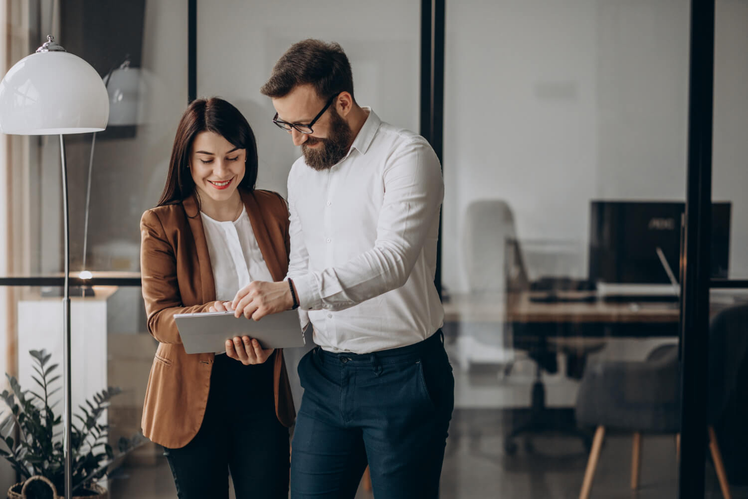 Two-business-partners-going through a file