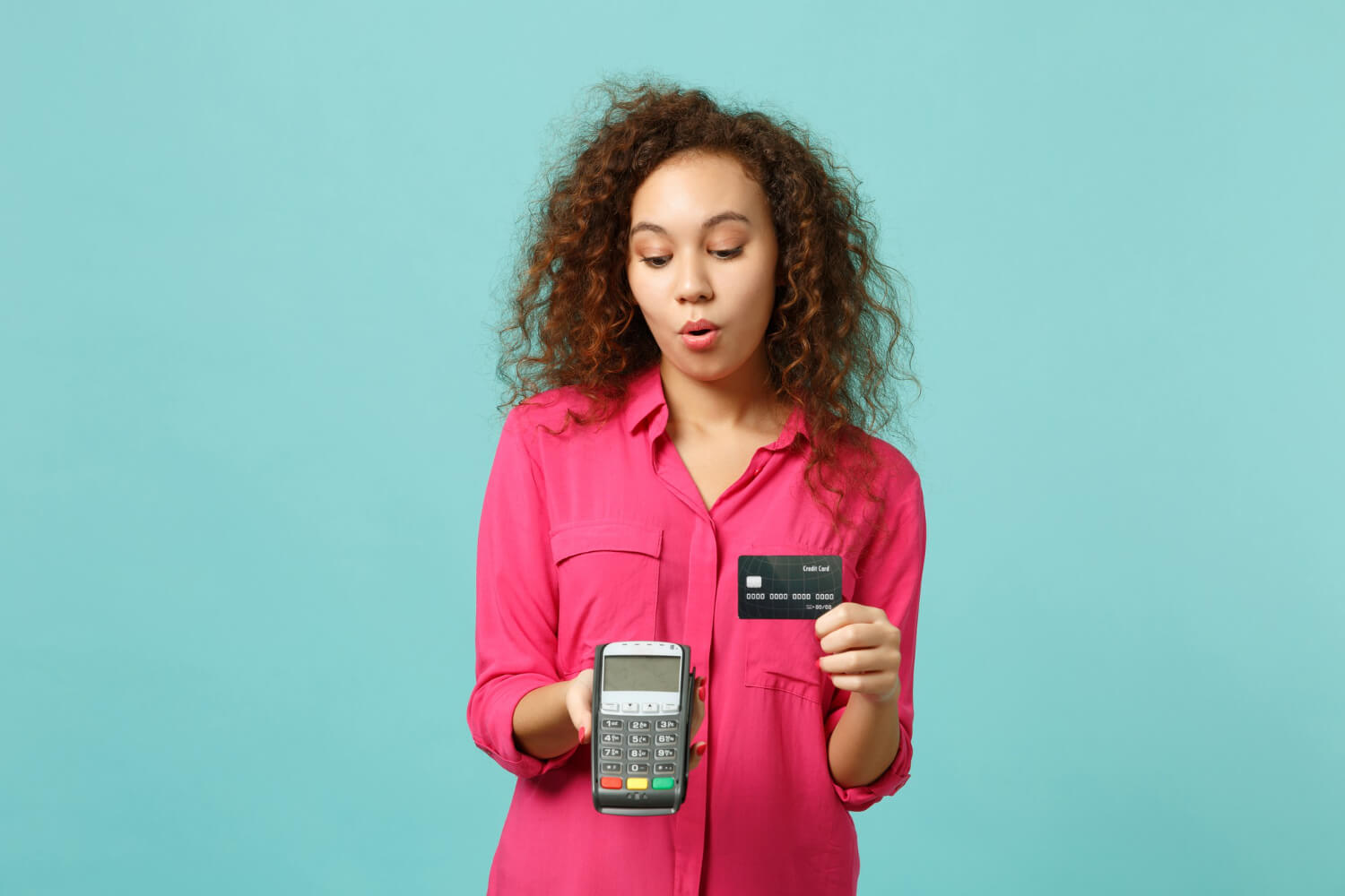 A woman making use of a POS machine