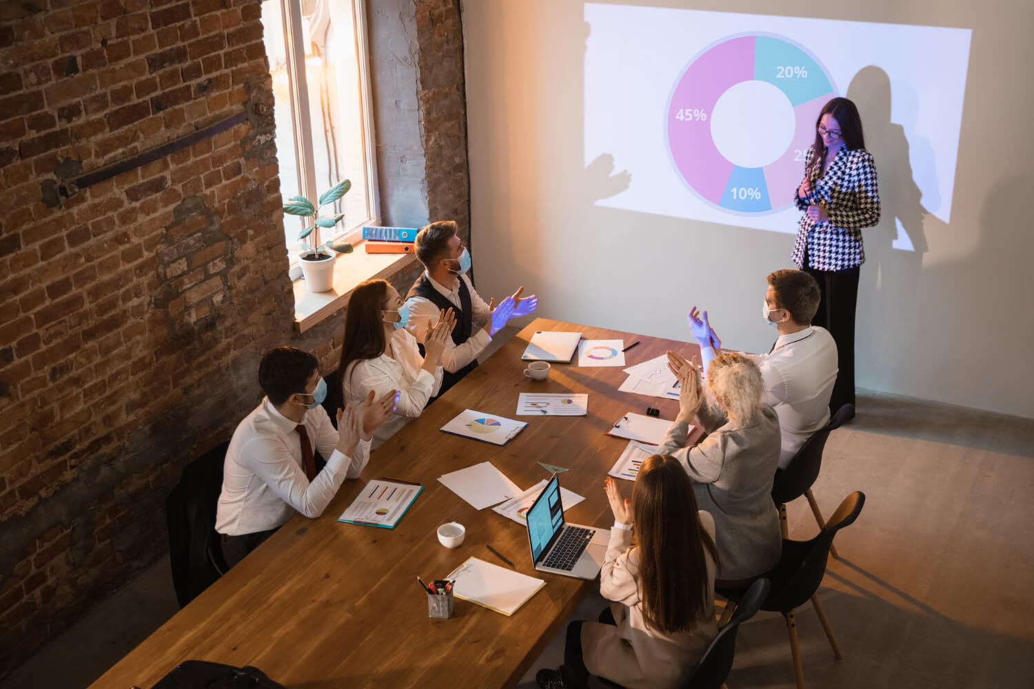 speaker-giving-presentation-meeting-room.