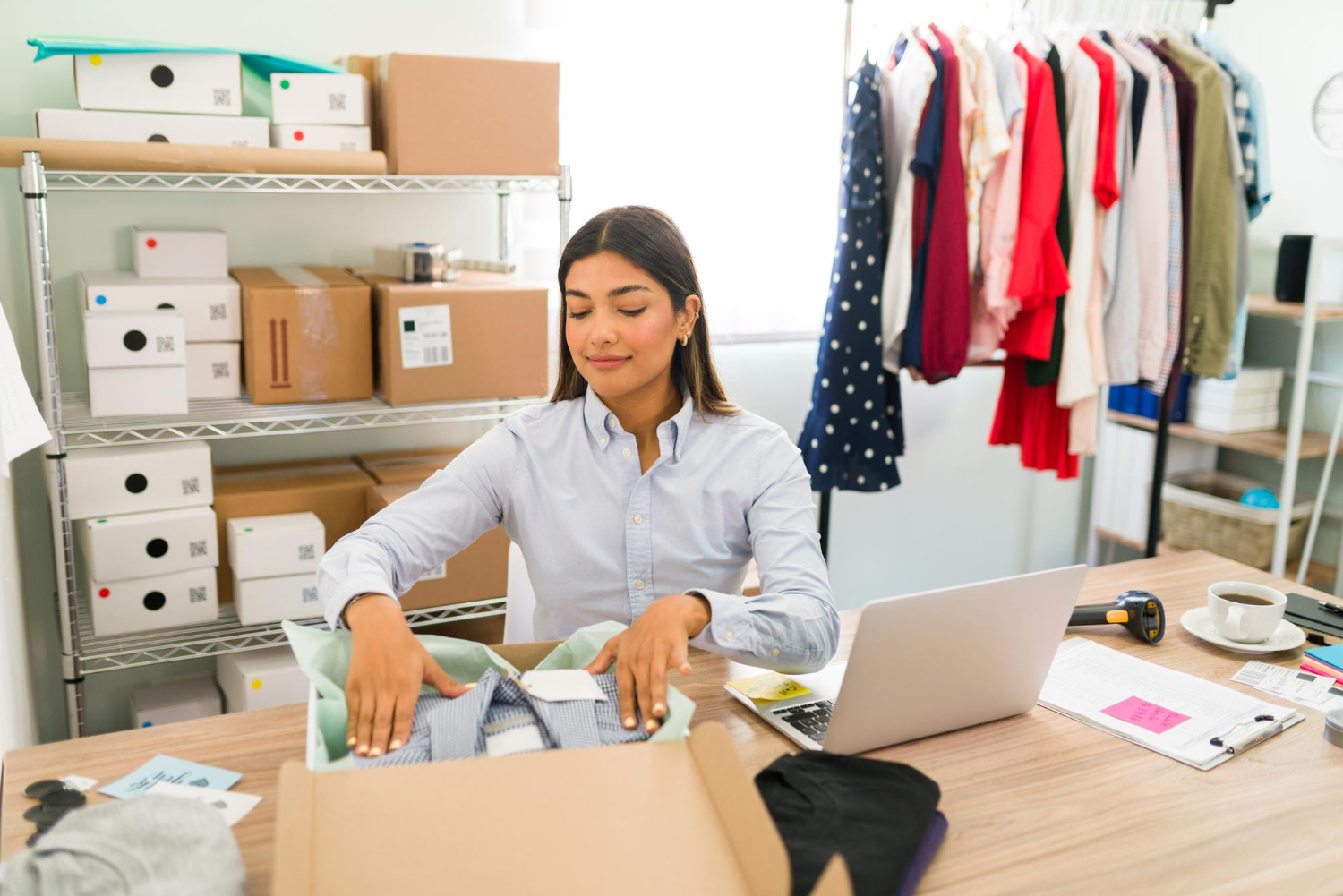 Small business owner in West Virginia smiling while in her office