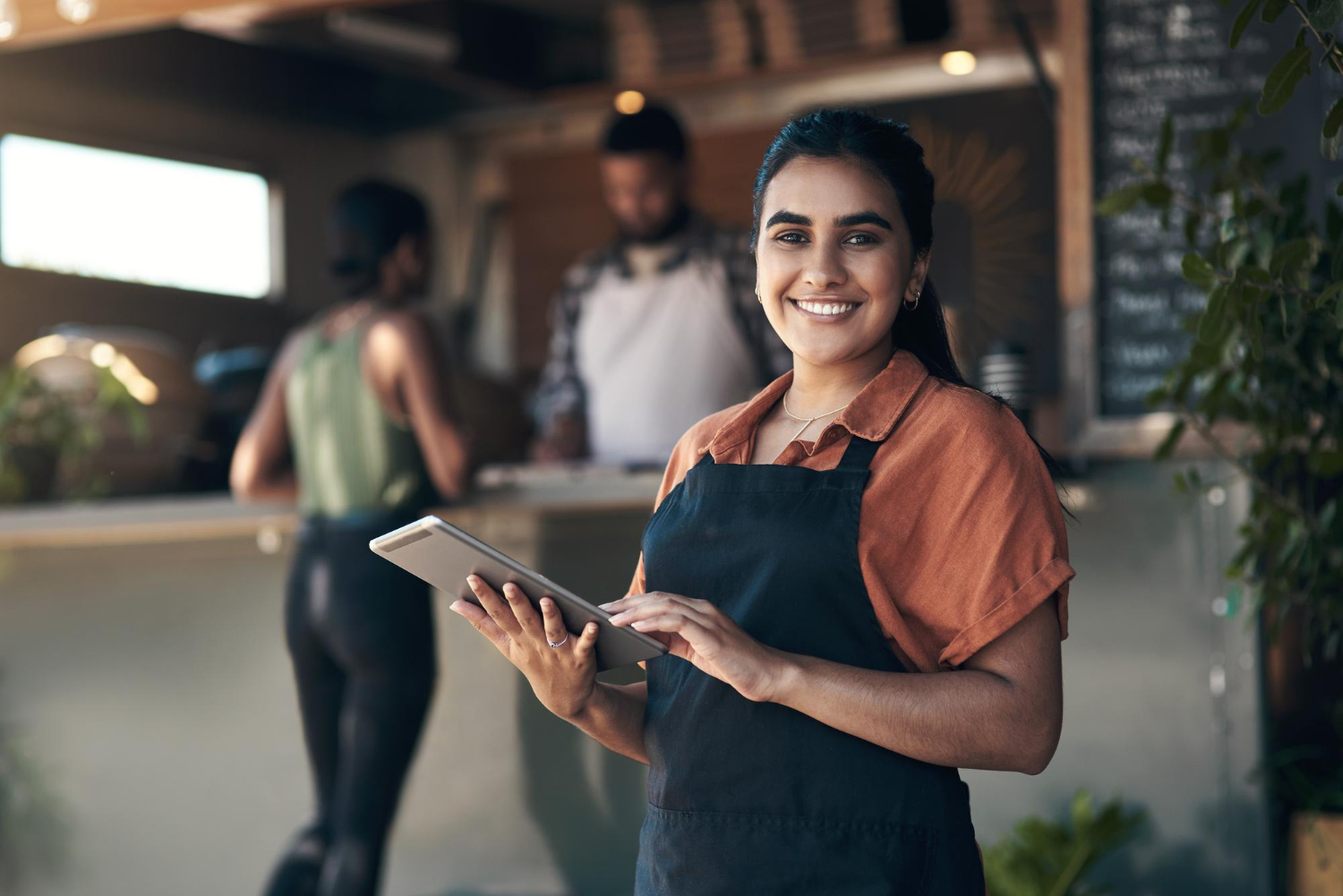 Waitress taking orders at a restaurant business