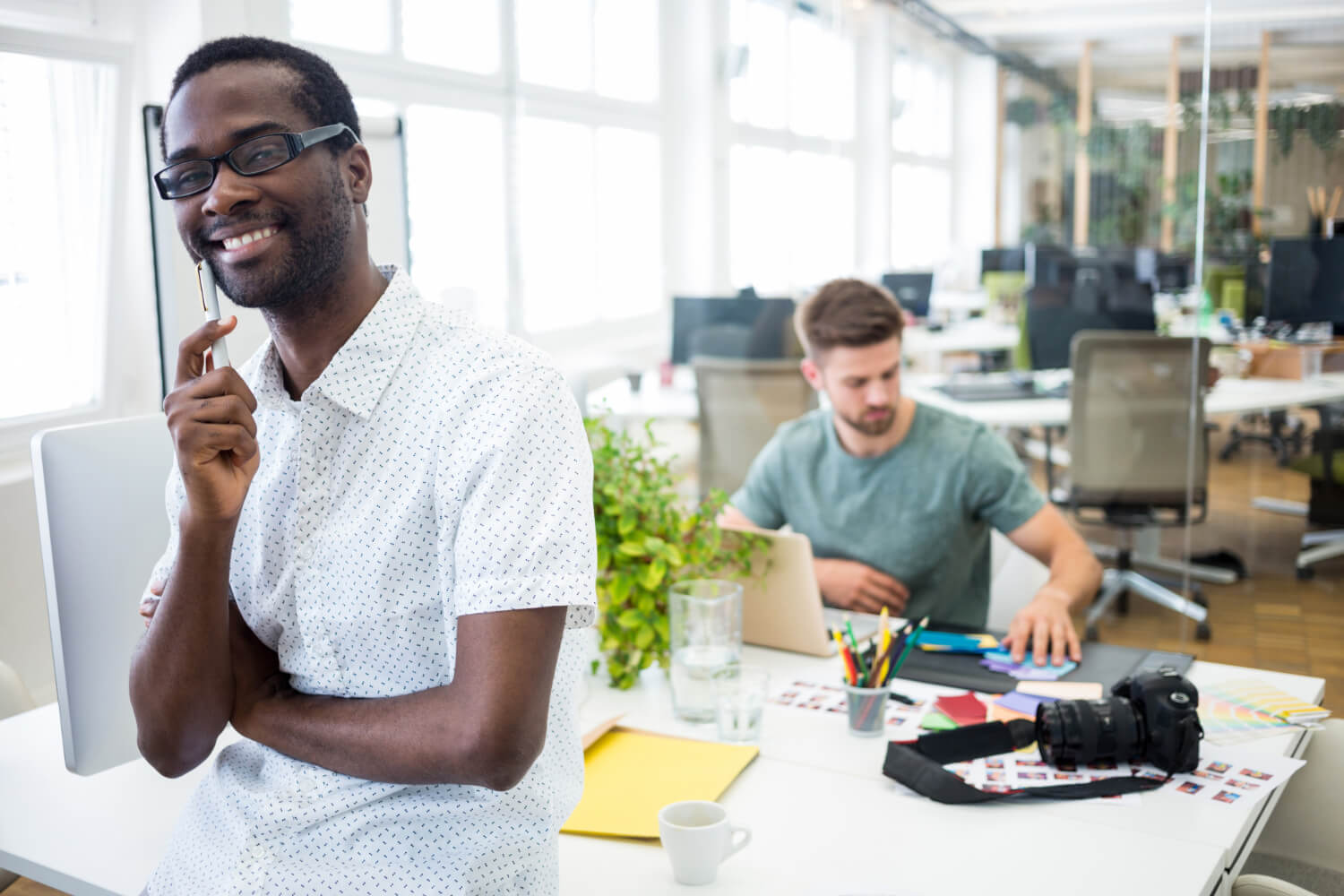 A photographer using a CRM in the office