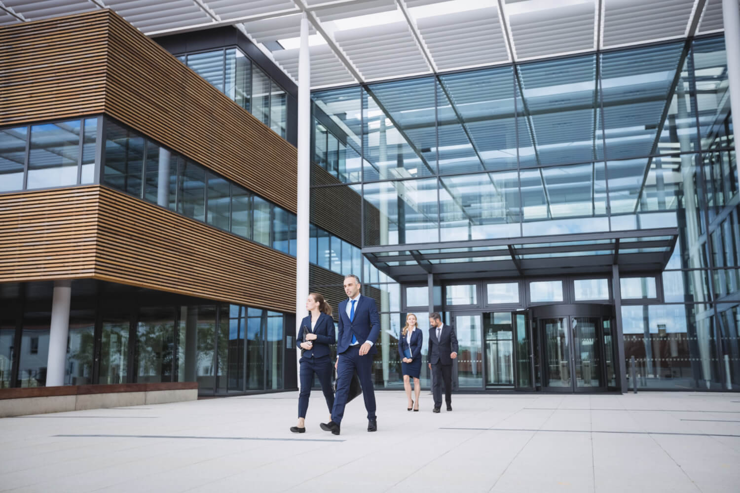 Business professionals working out of a business office complex