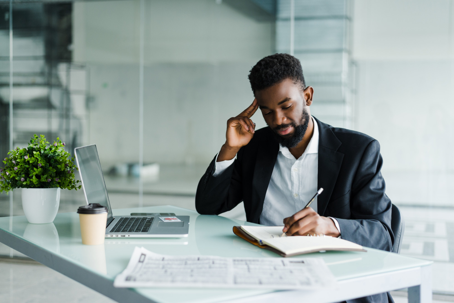 Young man working in an LLC company office