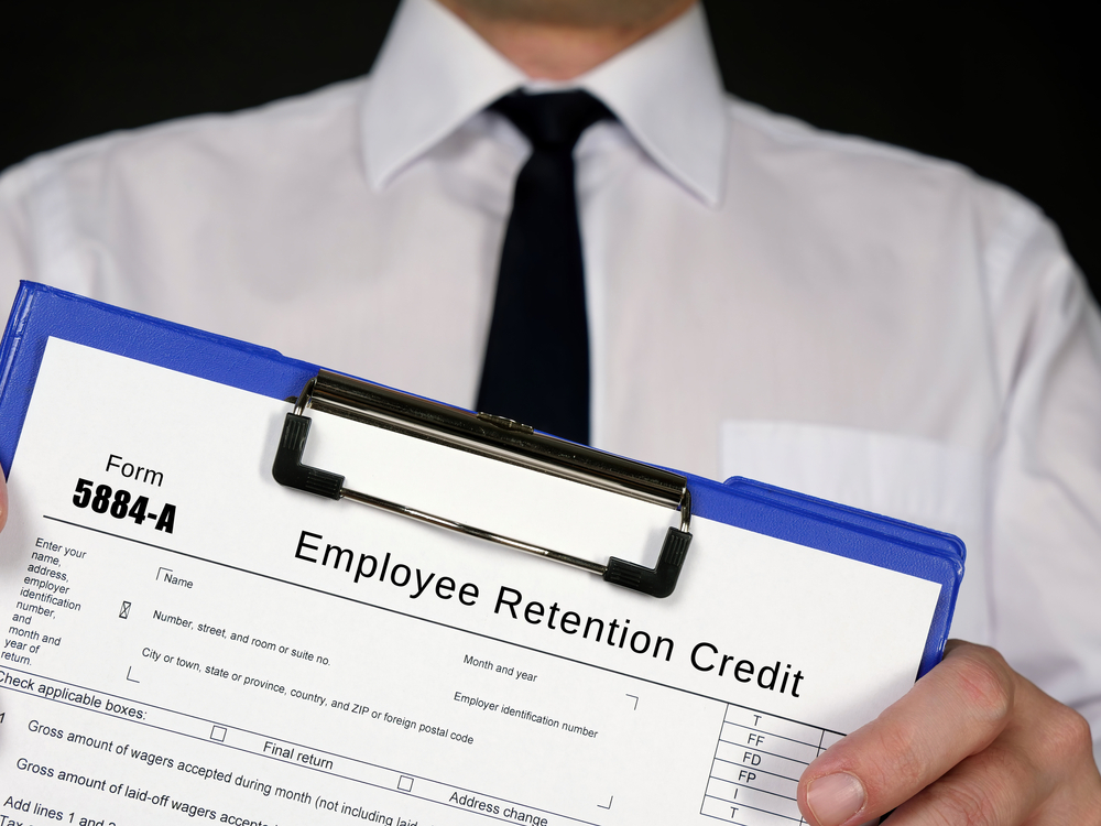 Businessman holding an ERC form